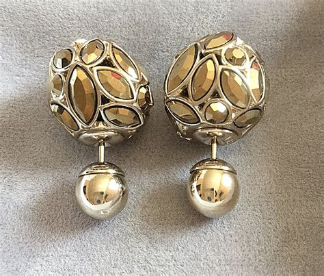 dior tribale earrings history